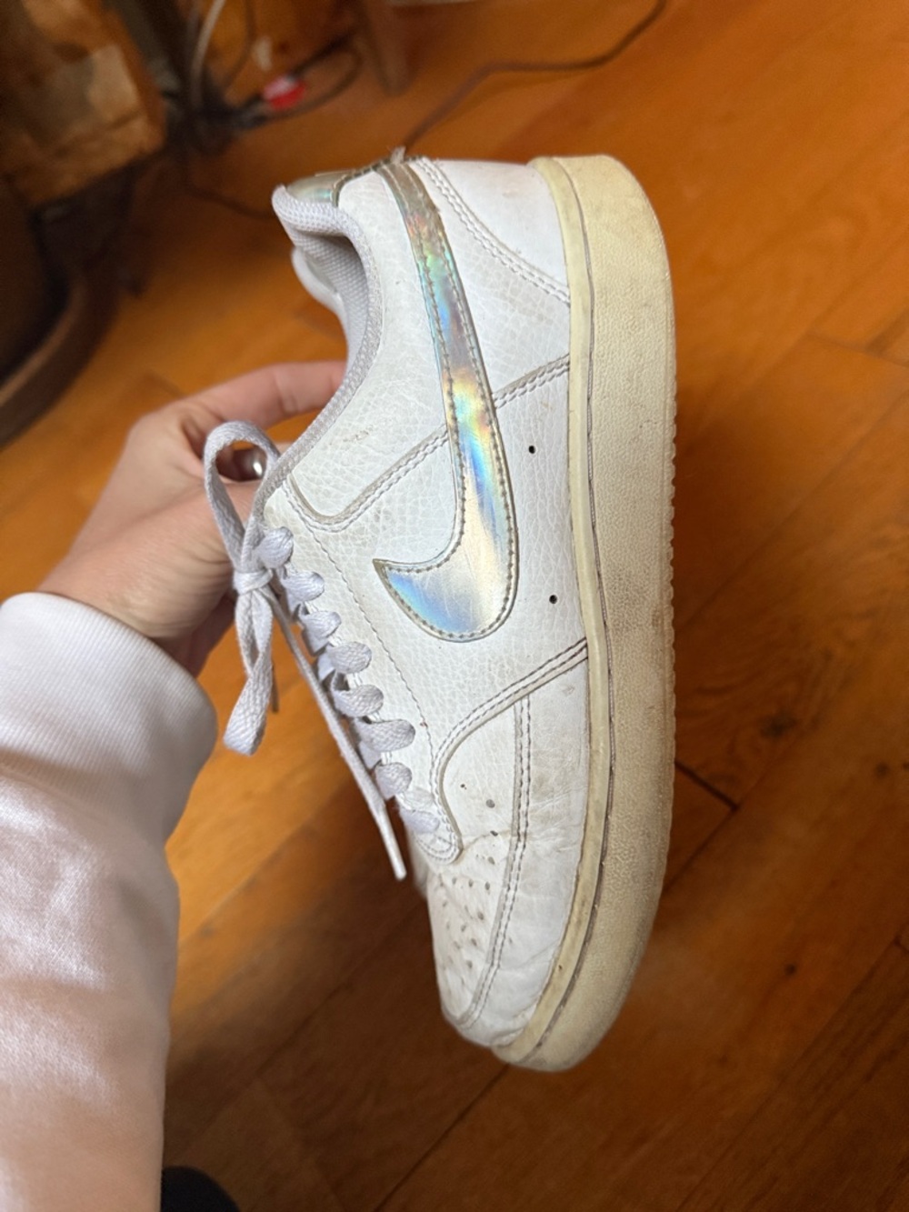 Nike Women’s White Sneakers with Holographic Swoosh